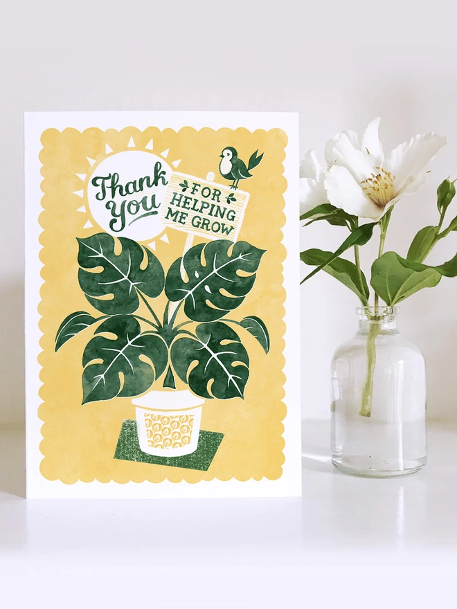 yellow and green teacher thank you card with white flower in vase