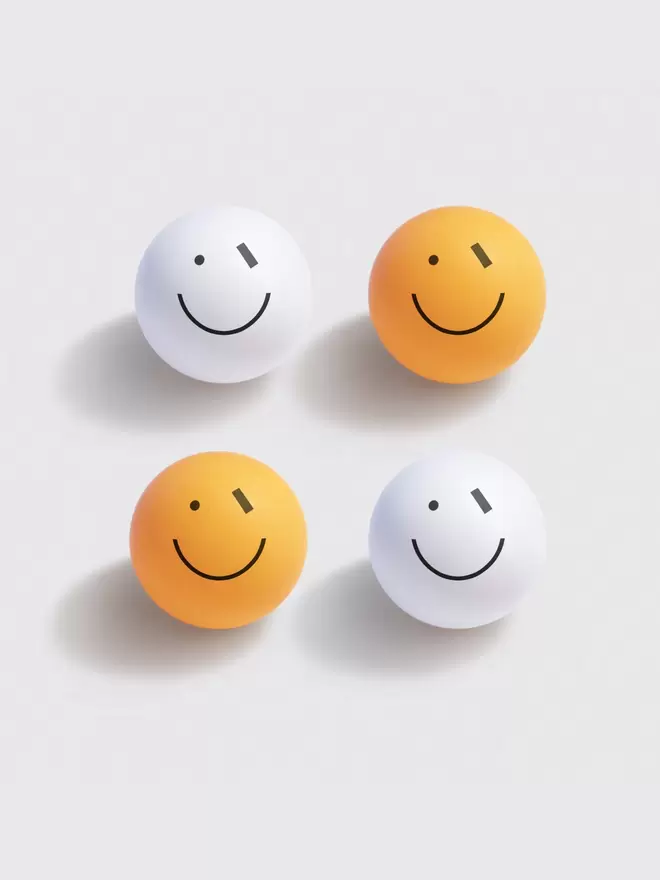 Smiley wink ping pong balls