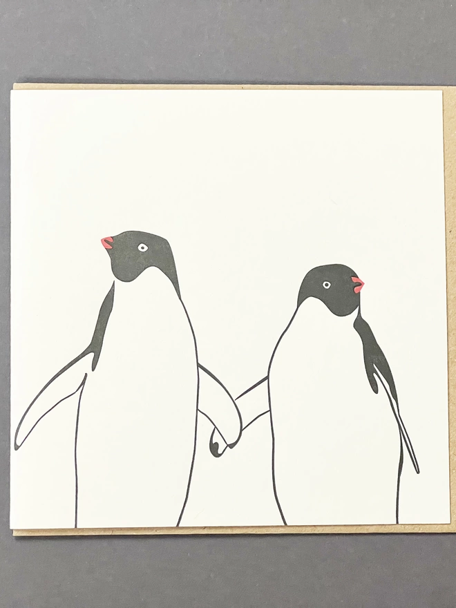 Full image of the Penguins In Love card that had two penguins holding flippers