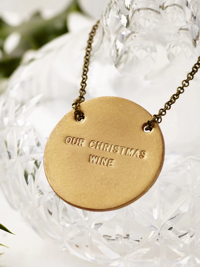 Gold decanter tags with gold lettering