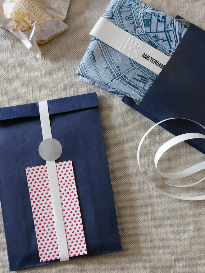 Optional Gift wrap of navy paper, ribbon and patterned gift card