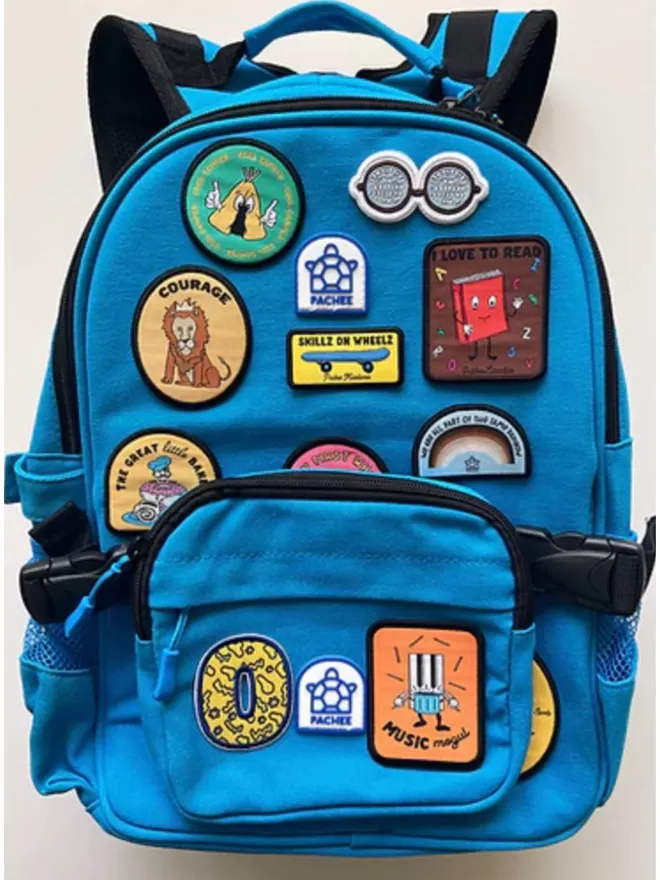Music Mogul Patch seen on a blue backpack filled with Pachee patches.
