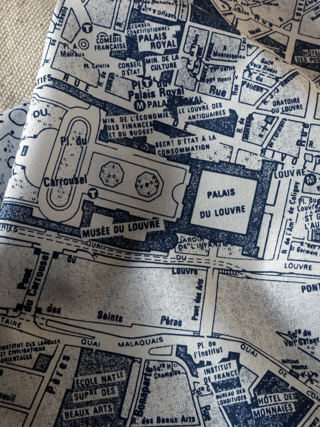 detail of a Mr.PS Paris Hankie in midnight blue showing the Musee du Louvre and the River Seine