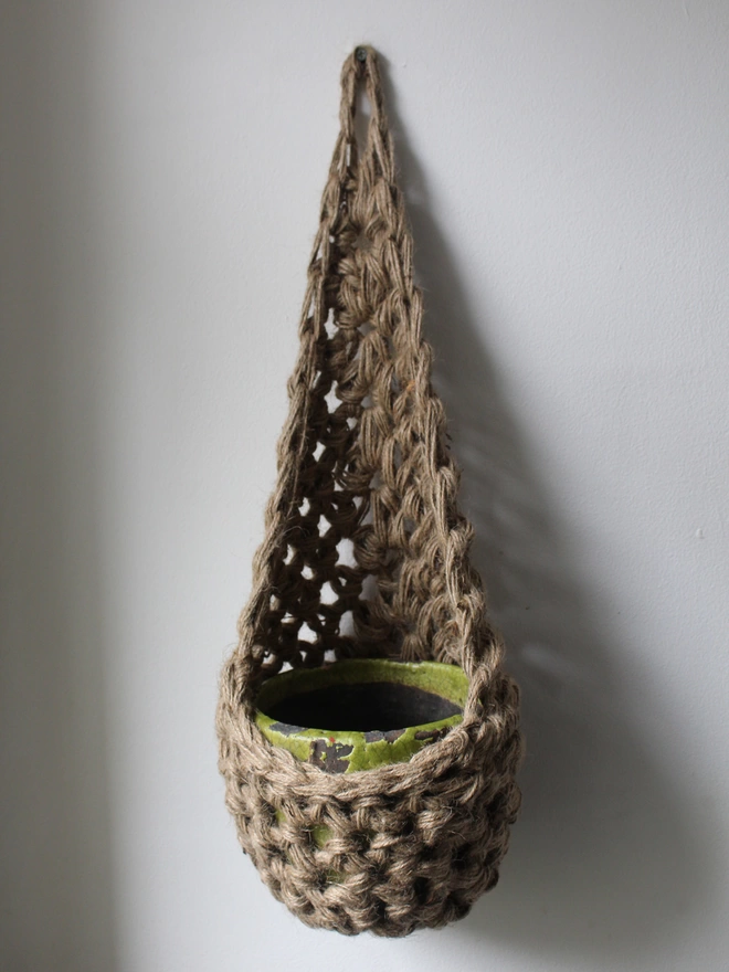 indoor and outdoor large brown jute hanging wall planter, fabric wall mounted plant holder, handmade crochet plant basket, handmade sustainable crochet decor, rustic natural organic homeware accessorie, hanging plant holder 
