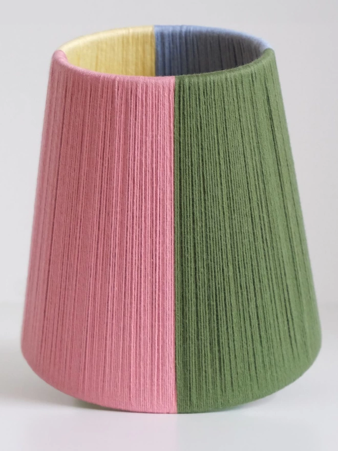 Quarter colourblock lampshade upright showing pink and green sections