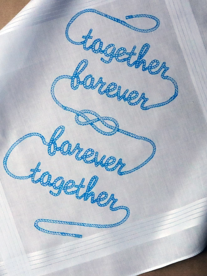A Mr.PS Together Forever hankie printed in sky blue