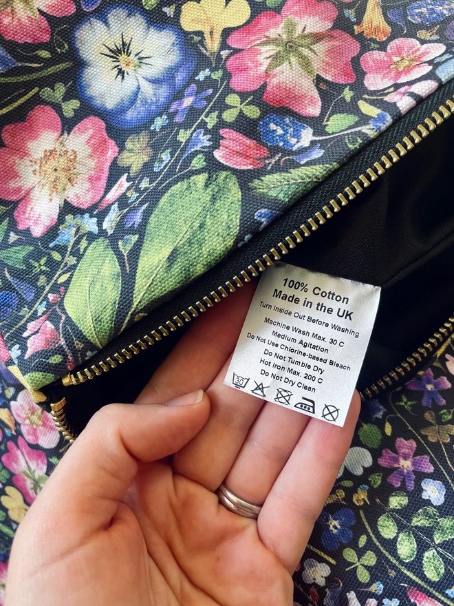 Care Instruction Label in Cotton Wash Bag, Flower Print and Black Lining
