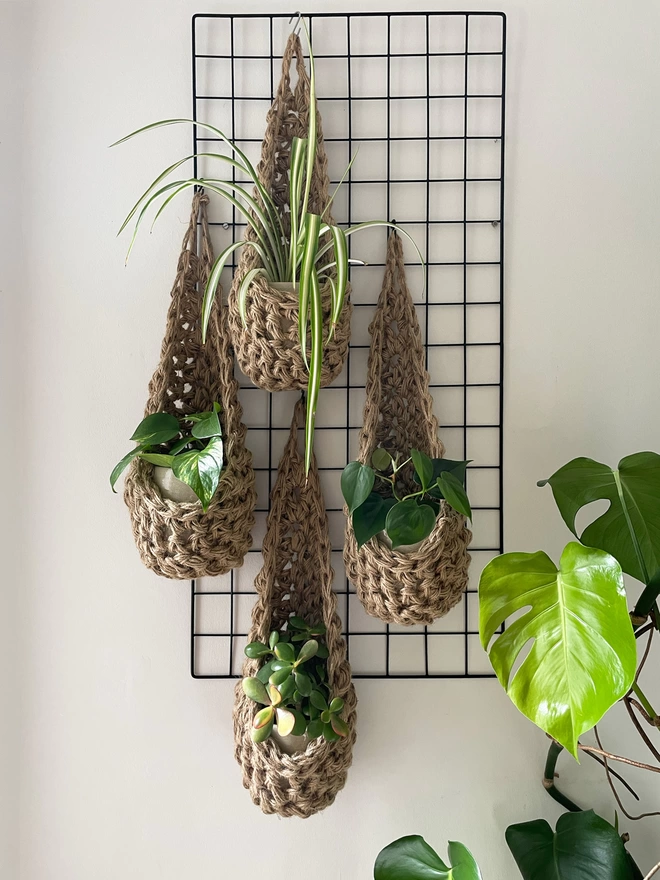 indoor large brown jute hanging wall planter, fabric wall mounted plant holder, handmade crochet plant basket, handmade sustainable crochet decor, rustic natural organic homeware accessorie, hanging plant holder 