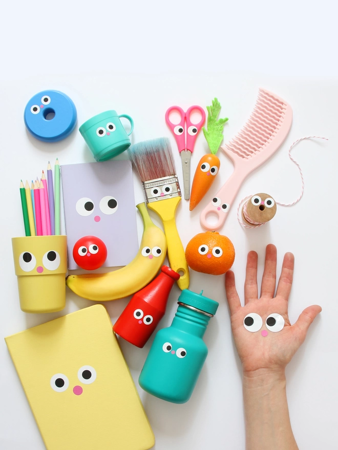 Stationary & household objects decorated with fun vinyl Eyes & nose stickers 