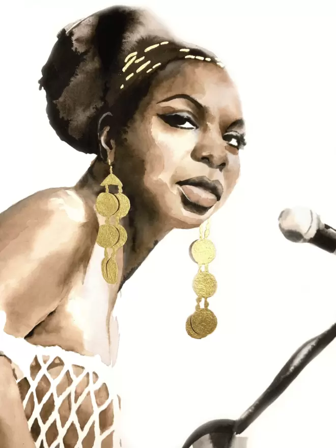 Portrait of a women leaning towards microphone during a performance. She wears dangling gold earrings and her hair is in a beehive up-do.