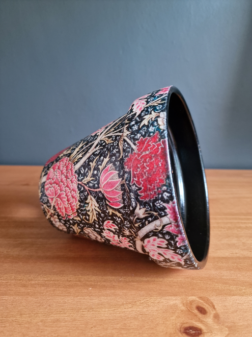 William Morris Cray design plant pot in a black and pink detailed floral design suitable for indoor or outdoor use.  15 cm in diameter and 13.7 cm in height