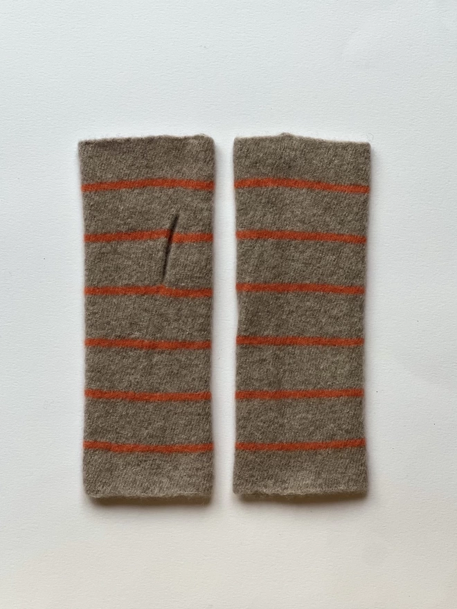 knitted wristwarmers shown side by side on a white background