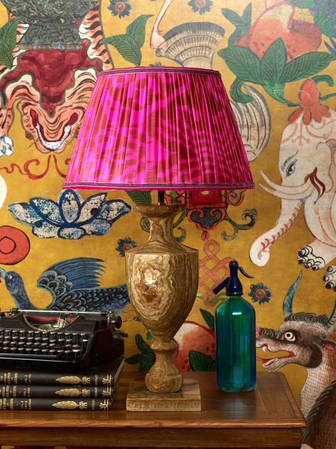 Maximalist Interior Design with Handmade Pink Silk Ikat Lampshade and Yellow Wall Art
