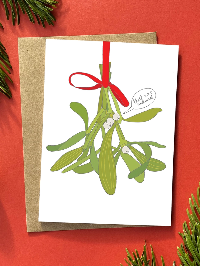 Festive Christmas card featuring mistletoe
