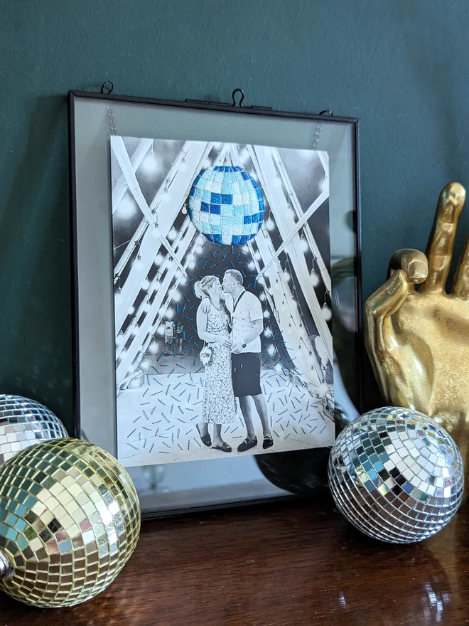Framed photo of shades of blue embroidered disco ball
