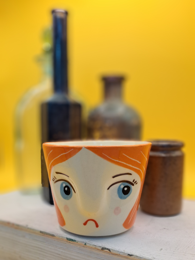 Grumpy side orange cup