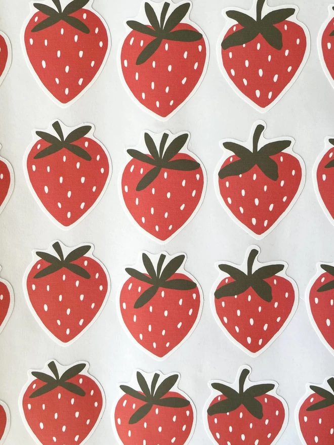 Close up of Strawberry fabric wall stickers on sheet