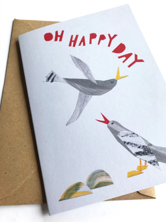 Illustrated greetings card by Esther Kent showing colourful lettering reading 'OH HAPPY DAY' and stylised bird.s