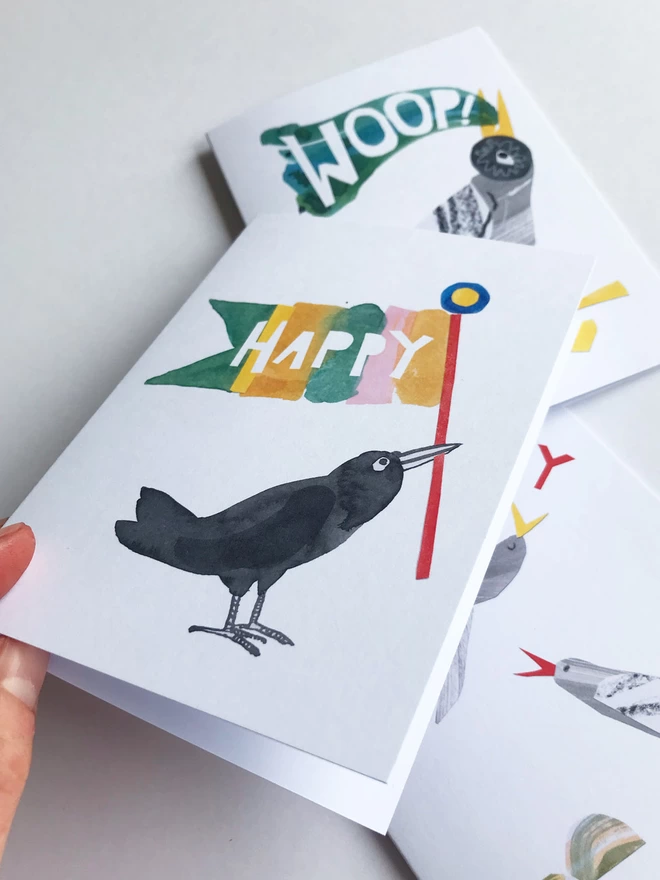 Set of three illustrated greetings cards by Esther Kent showing colourful lettering and stylised birds..