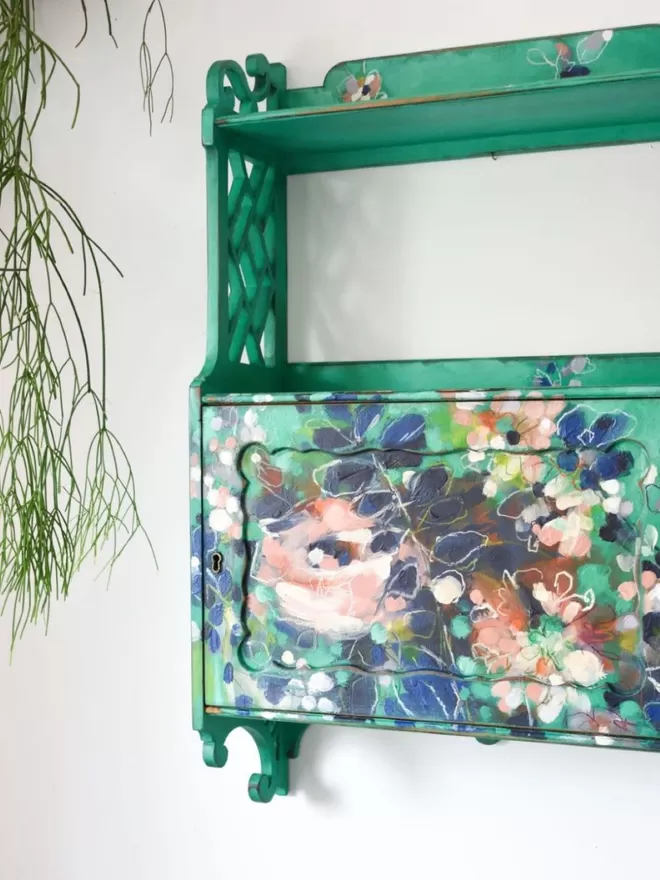 Vibrant green floral wall shelf