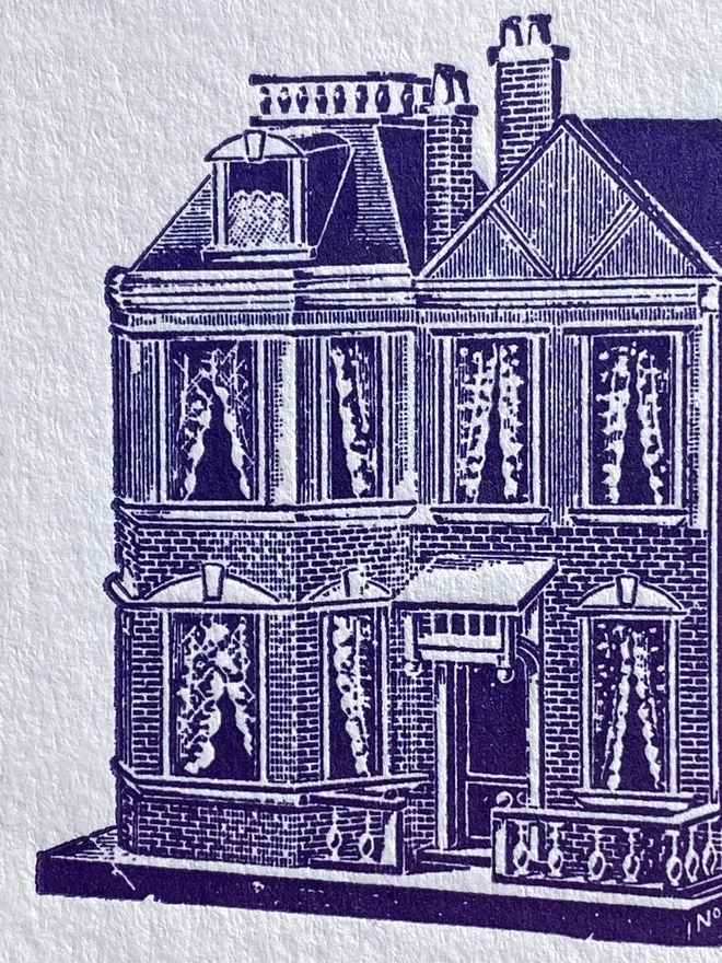 Close up of a purple illustration of a dolls house