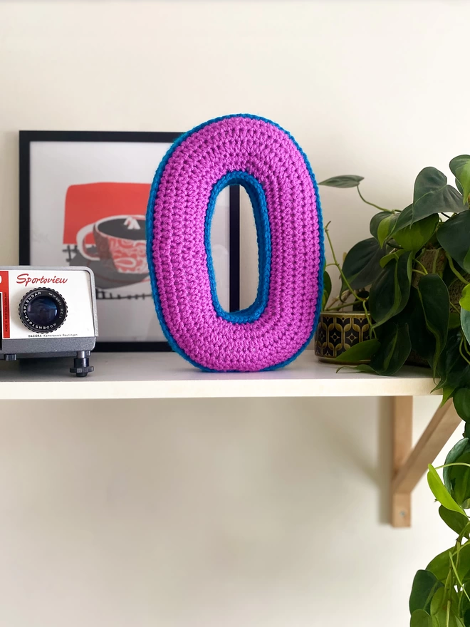 O Shaped Cushion in Magenta and Blue