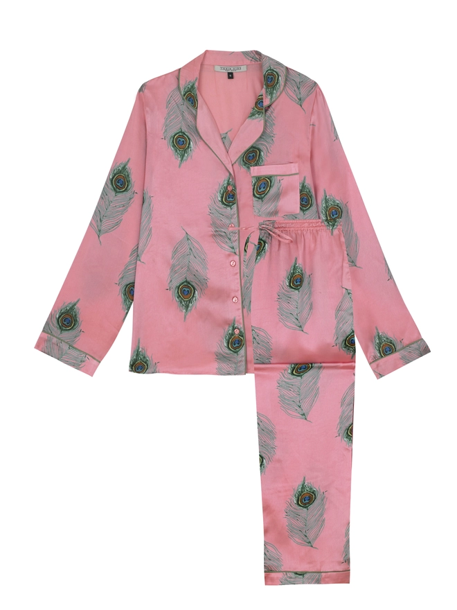 Pink based satin traditional pyjamas with button through shirt with green and orange peacock feather design all over