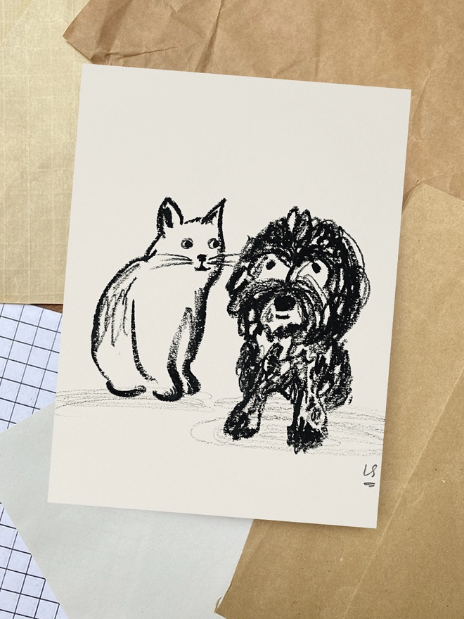 black and white line drawing of dog and cat on white paper