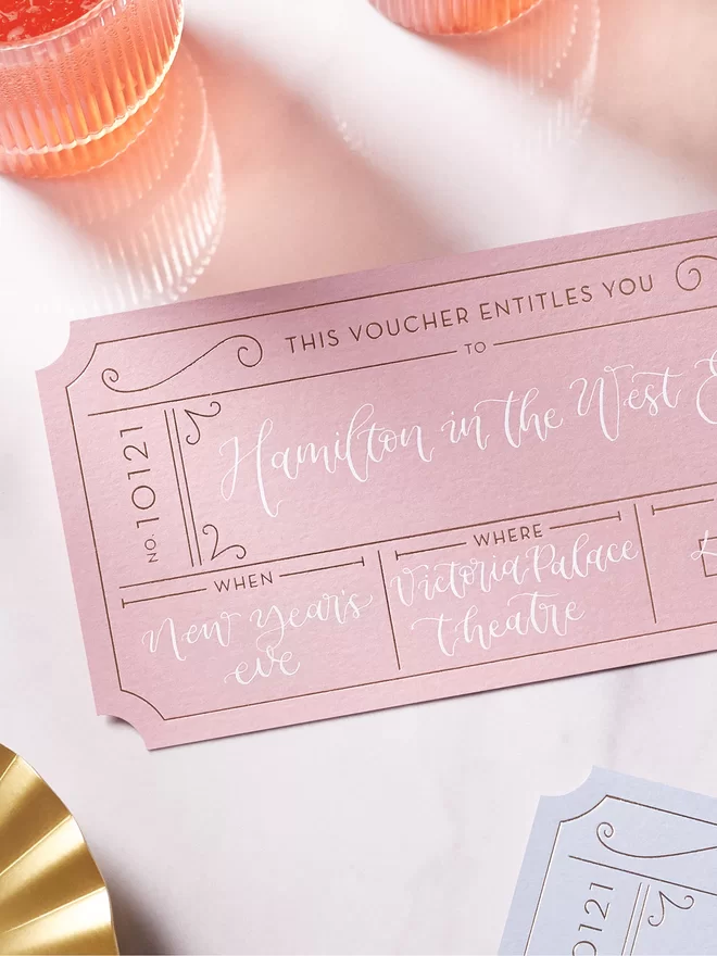 pink and white personalised golden ticket for concert surprise reveal