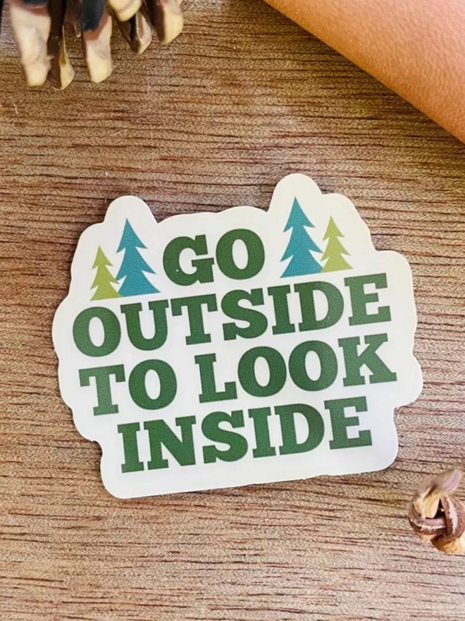 Go outside to look inside sticker