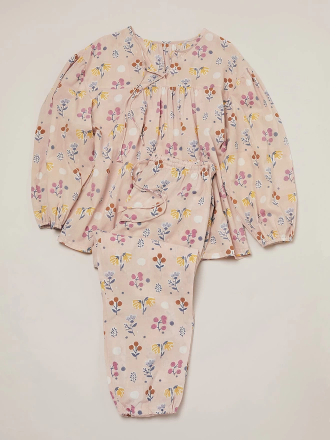 Pale pink pyjama set with a small floral block printed design