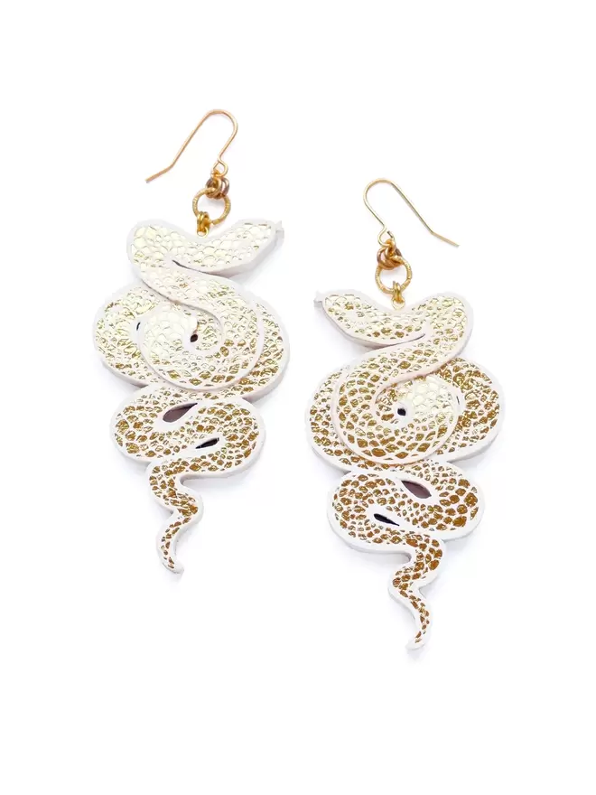 large gold & white serpent earrings