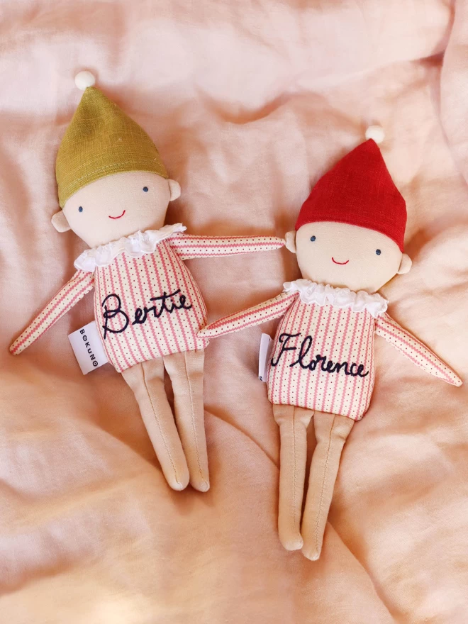 handmade elf dolls in stripe top and red or green hat with a name embroidered