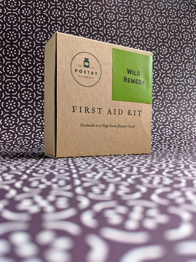 Wild Remedy First Aid Kit on patterned paper