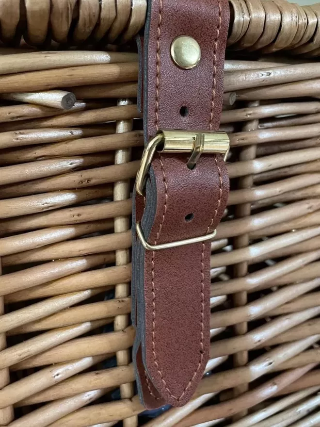 Detail of the buckle on wicker hamper