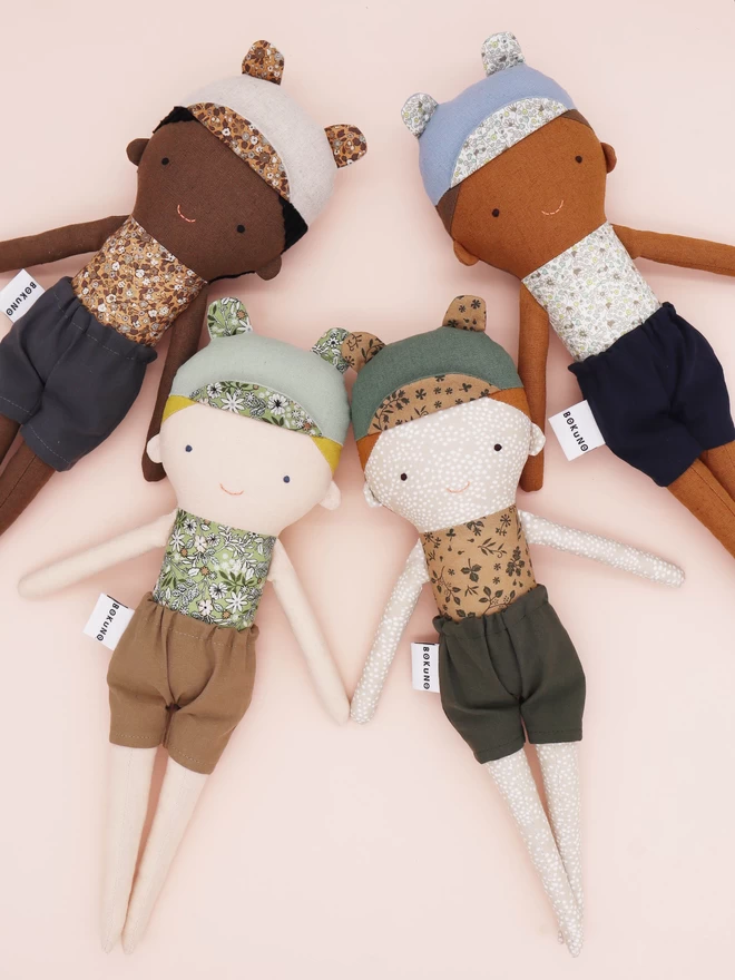 Fabric boy dolls with dark, freckle, light and brown skin tones