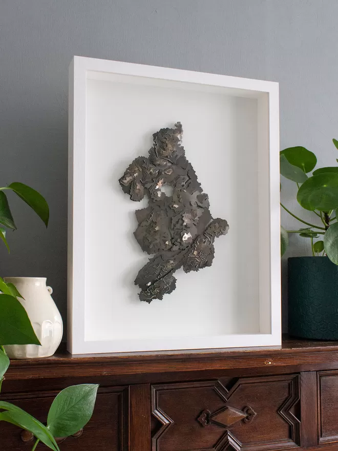 side view of the framed metal Snowdonia contour map wall piece