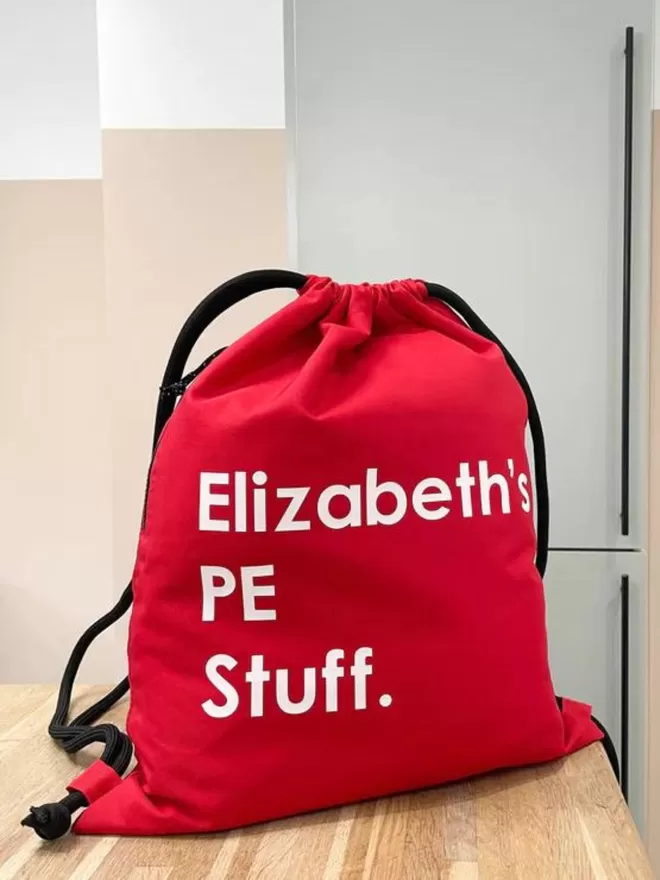 Red personalised waterproof PE bag with hidden pocket