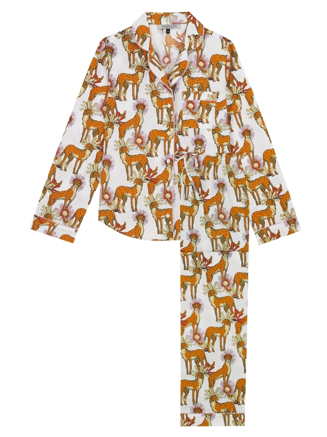 Flat shot of traditional full length white untamed cheetah print pyjamas 