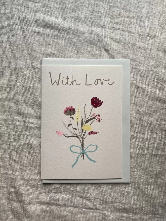 with love card with a bunch of flowers on it