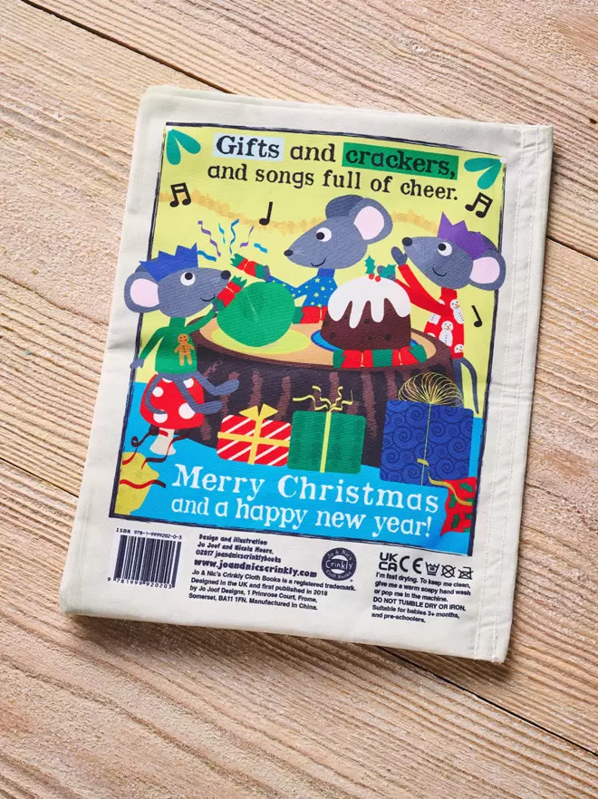 Christmas is Here crinkly cloth book back cover.png