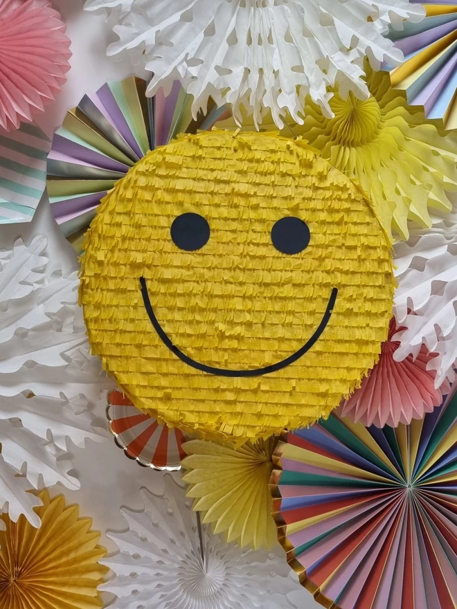 yellow smile pinata custom made by pinyatay