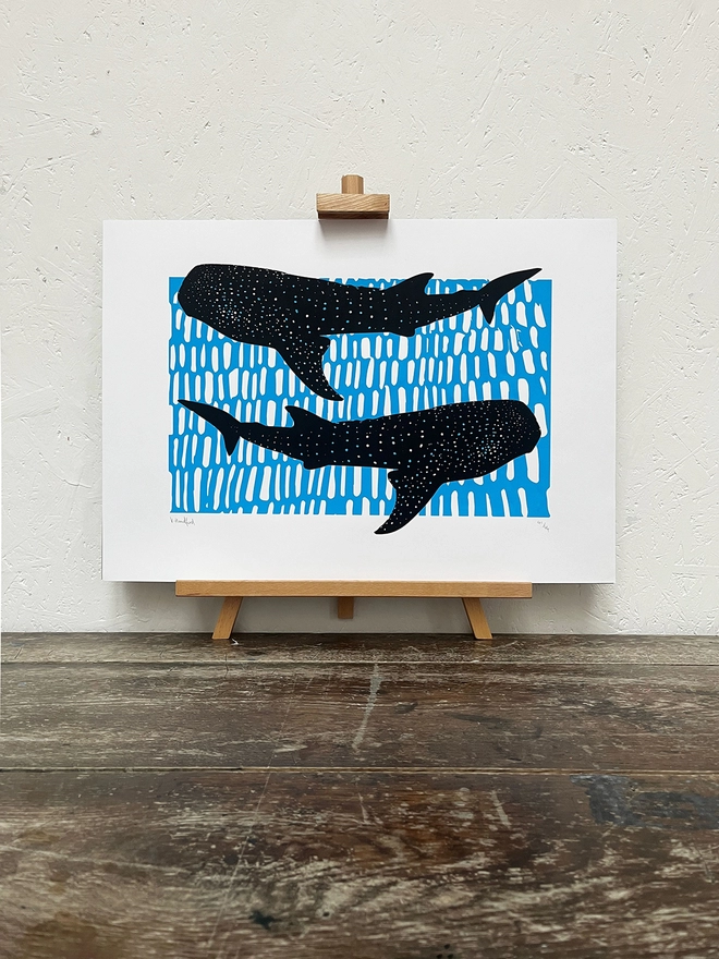 Whale Sharks (Black and Blue) – Screen Printed Poster - on an easel