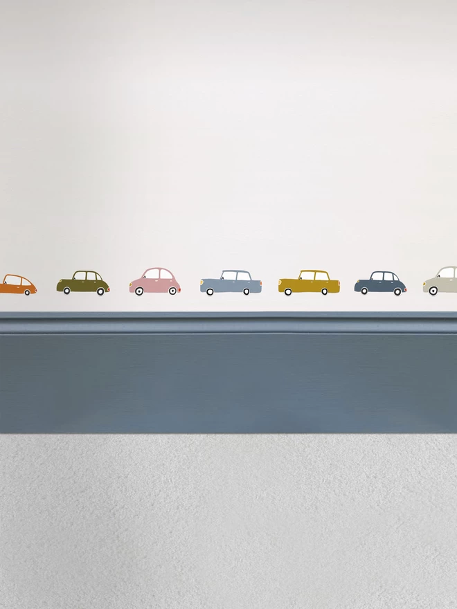 Retro Car Wall stickers in kids room above dark blue painted skirting board