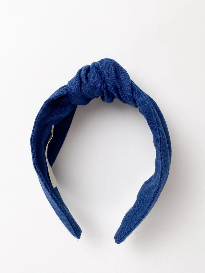 Flat view of loveyl navy lien hairband for women handmade in our somerset studio