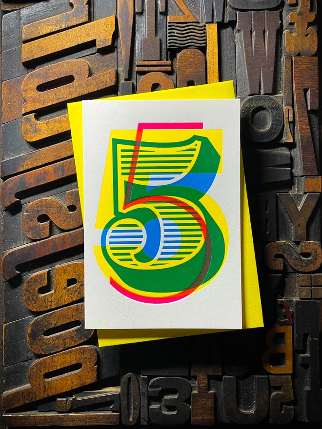 5th birthday anniversary milestone typographic letterpress card with deep impression print Very colour and vibrant. They show slight colour variations adding to the style and charm of this handmade greeting card.