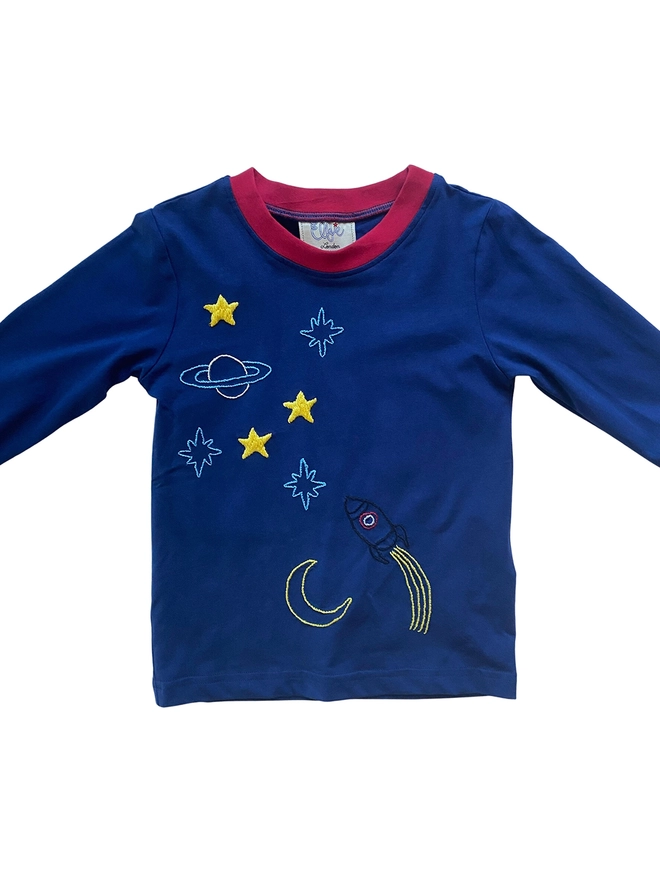Navy pyjama top with red collar and cuffs with a hand-embroidered space scene