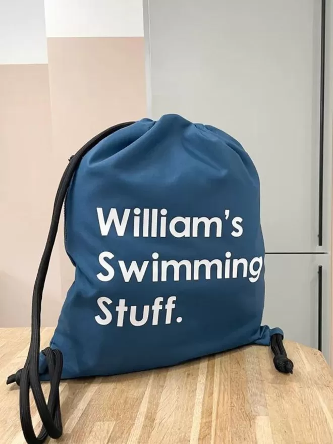 Blue personalised waterproof PE bag with hidden pocket
