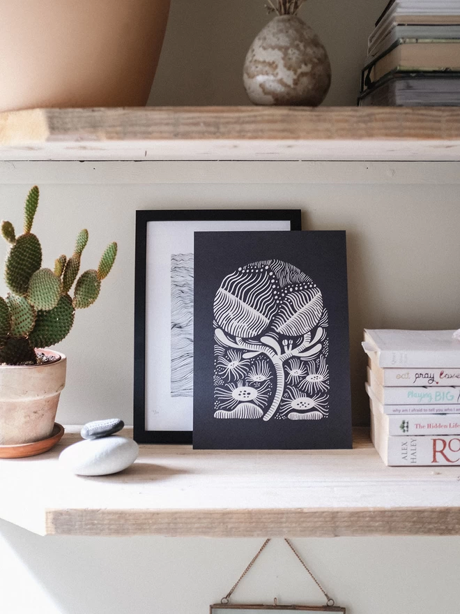 Black and white abstract flowers print illustrated in an arched shape