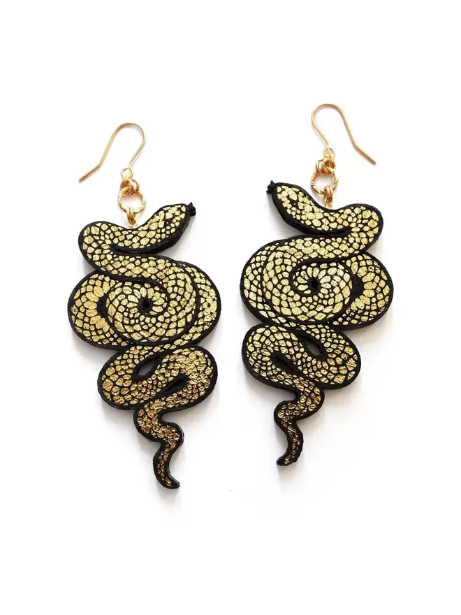 large gold & black serpent earrings